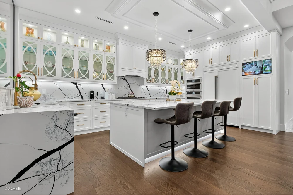 Modern kitchen interior with island and natural light